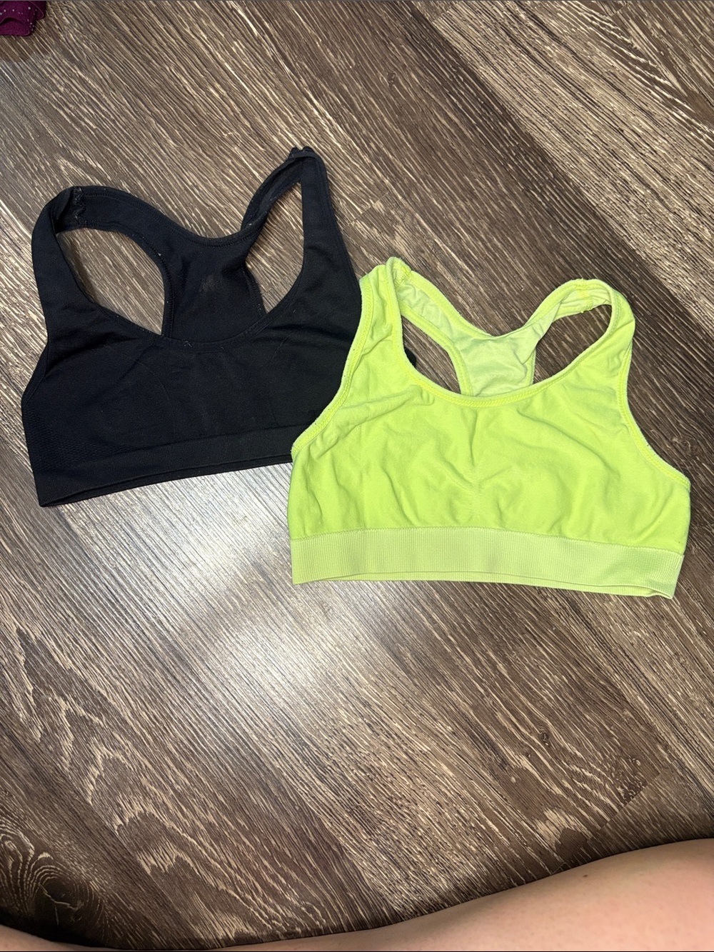 A set of 2 Girls sports bras size medium